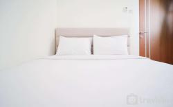 CozyLiving 2BR at Puncak Dharmahusada By Travelio
