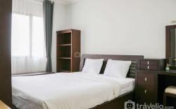 Cozy Living and Modern 2BR Puri Garden By Travelio