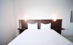 Simple 2BR Extra Bed at Menara Rungkut By Travelio