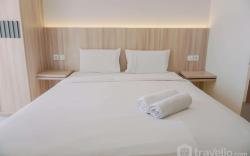 Homey and Warm Studio Amazana Serpong By Travelio