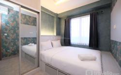 WarmDesigned 2BR at Podomoro Golf View By Travelio