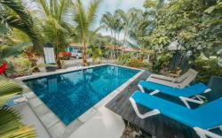 Rooms & Pool Macaws