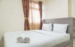 Good Relax 2BR Green Pramuka City Apt By Travelio
