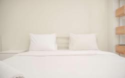 Minimalist 1BR Cinere Bellevue Suites By Travelio
