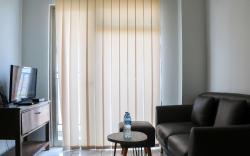 Cozy 2BR at Mekarwangi Square Apt By Travelio