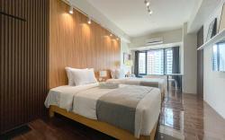 Business Luxury in a Twin Bed Suite 2X55