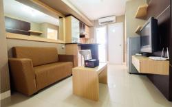 Homely 2 BR Bassura City Apartment By Travelio