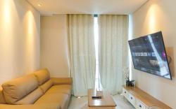 Nice and Warm 2BR Casa Grande Residence ByTravelio