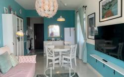 Elegant Seaside Apartment with Amenities