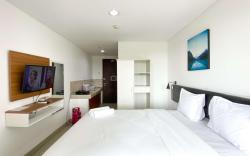 Minimalist Studio at Enviro Apartment By Travelio