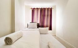 Compact 2BR at Apt Vida View Makassar by Travelio