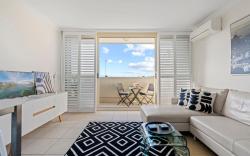 Top Floor Apartment with Balcony in Great Location