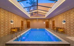 Teak Leaf Gateway | Swimming Pool | Indoor Games
