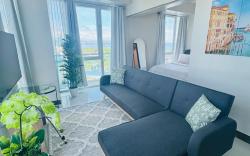 Condo/ Free Airport Pick up/ Beach & Pool Access 