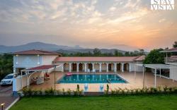 StayVista at Rio Vista with Pool, Lawn, Music Speaker & Game