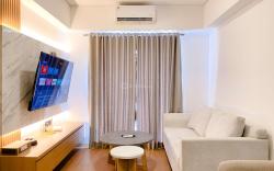Homey 2BR with Work Space at Meikarta By Travelio