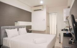 Studio Cozy Living at Green Bay Pluit By Travelio