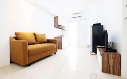 Comfy 2BR Bassura City Apartment By Travelio