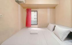 Homey 2BR @ Gateway Ahmad Yani Cicadas By Travelio