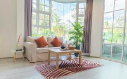 Cozy 1BR apartment by beach - partial ocean view