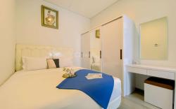 Comfort & Homey 2BR at Sudirman Suites By Travelio