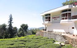PERINBA VILAS INN