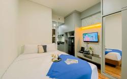 Cozy Studio Apt at Transpark Cibubur By Travelio