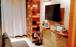 Luxury Industrial-themed Condo in Fame Residences