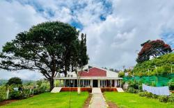 Nilgiris INN Deluxe Room