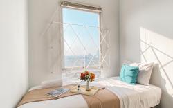 GoodPlace 2BR at Patraland Urbano Apt By Travelio