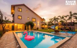 StayVista at Dusk by the hills