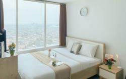 Cozy Studio at Apt Grand Kamala Lagoon By Travelio