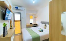 Elegant Homey Studio Urbantown Serpong By Travelio