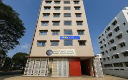 FabHotel A White Pearl Suites - Bangalore Airport Road