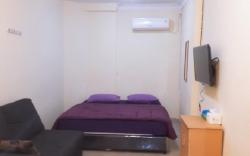 Jakson Homestay Batam - DELUXE with SOFA ROOM I