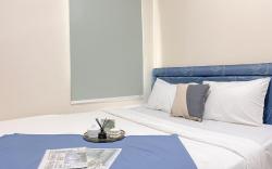 Good Homey 2BR at Green Palm Residence By Travelio