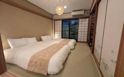 Garden Suite w/ Kitchen & Washer, Near KIX, 2 Beds