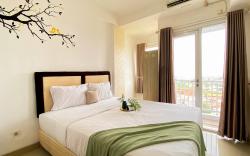 Homey & Cozy Living Studio at Poris 88 By Travelio