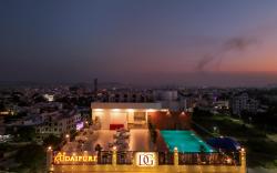 Hotel De Glance - Udaipuri Restaurant I Terrace Swimming pool I Banquet
