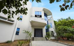 Super Hotel O ECR Stays Near Nemmeli Beach Formerly GVS Homes