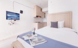 Relaxing Studio Urbantown Serpong By Travelio