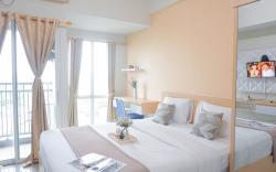 Cozy Stay Studio at Grand Dhika City By Travelio