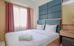 Restful 2BR Apt Podomoro Golf View By Travelio