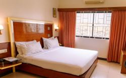 Bisque Magaji Orchid - Near Majestic Railway Station