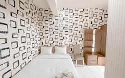 Minimalist 2BR Tamansari Prospero By Travelio