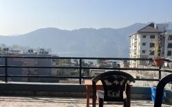 room with sharing kitchen and perfect view of lake