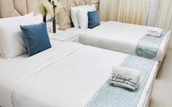 Homefort Twin Bed Suite - Red Residences Makati 2