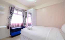 Apt 2BR Pool View Green Pramuka City By Travelio