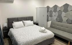 Academy’s Blue Apartment by Athens Urban Retreat