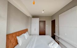 Strategic 1BR at Grand Sungkono Lagoon By Travelio
